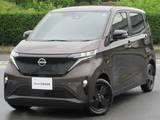 日産 サクラ X 90周年記念車 展示試乗車UP　　20Kw　Mナビ　AVM